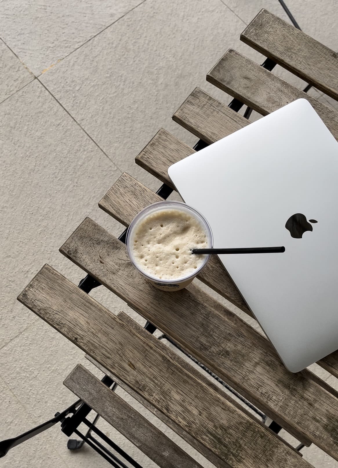 laptop with iced coffee. Cover photo for blog about how to increase email deliverability.