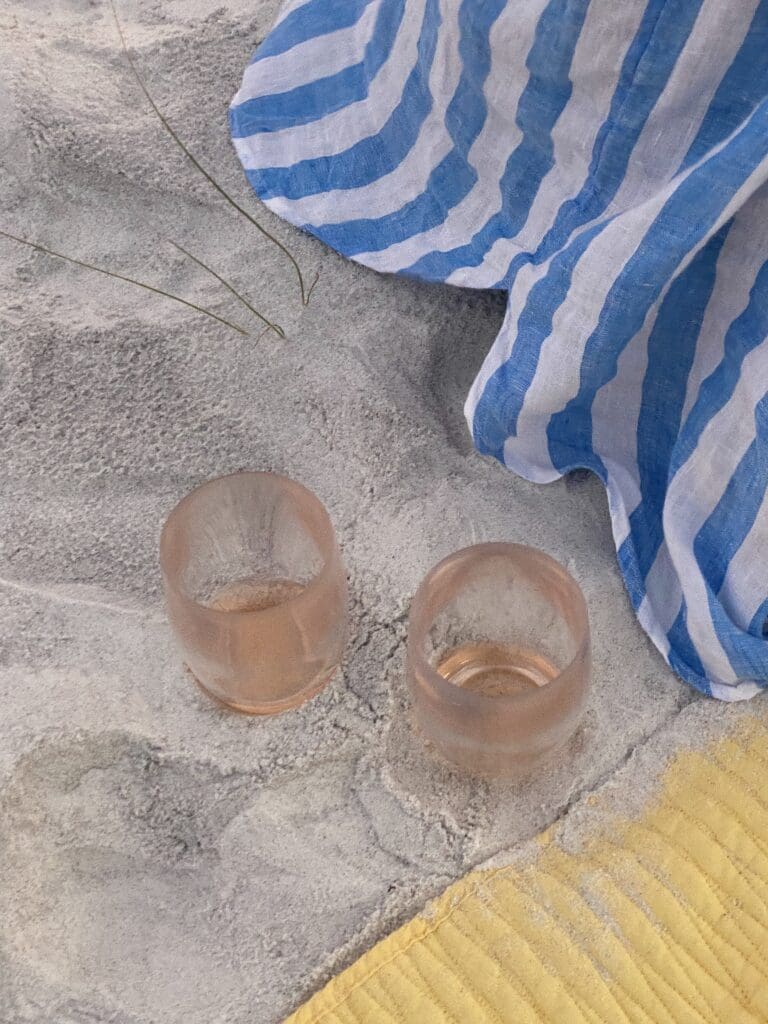 wine glasses on the beach. instagram posts on google search content tips.